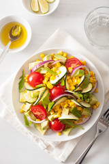 spiralized courgette salad with sweetcorn tomato avocado, healthy vegan meal