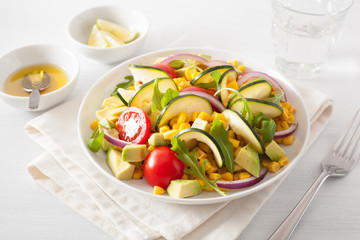 spiralized courgette salad with sweetcorn tomato avocado, healthy vegan meal