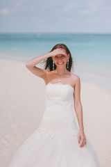 Fototapeta na wymiar Bride on the beach