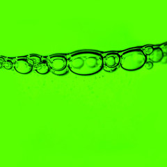 bubbles under water on blue background.