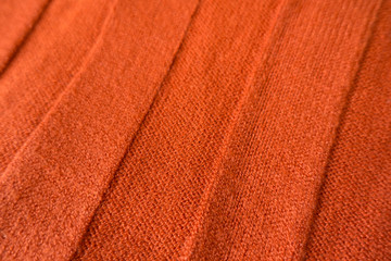 Orange stockinet fabric with wide relief stripes