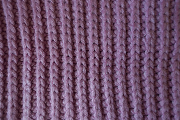 Fototapeta premium Vertical wales of handmade pink rib knit fabric