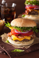 bacon cheese burger with beef patty tomato onion