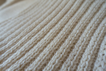 Close up of cream handmade rib knit fabric