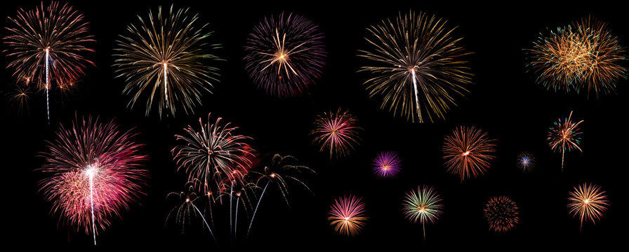 A variety of colorful fireworks isolated on black background