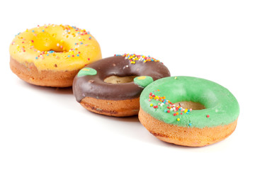 three glazed donut isolated on white background