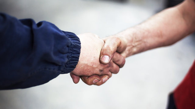 Handshaking of Two Workers