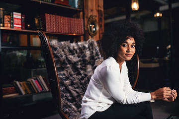 Female entrepreneur taking a break from work in office