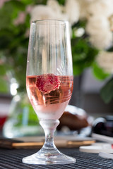 Wine glasses on table at garden in a sunny day