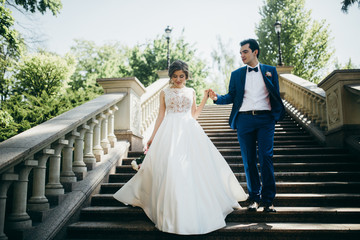 Very happy wedding couple at summer