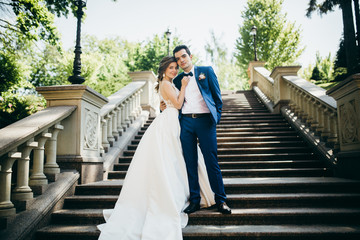 Very happy wedding couple at summer