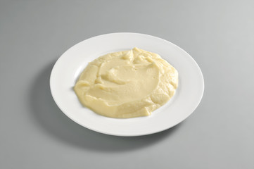 Fototapeta na wymiar Round dish with mashed potatoes
