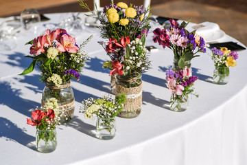 Close-up of tiny bouquets on a restaurant table