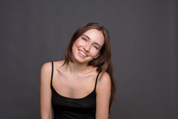 Naklejka premium Young laughing attractive woman portrait