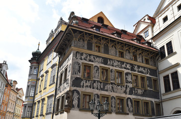 Fototapeta na wymiar An ancient painted house in Old Town Square in Prague, Czech Republic