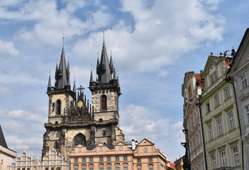 Fototapeta na wymiar Church of Mother of God before Týn or Church of Our Lady before Týn in the Old Town Square in Prague, Czech Republic, with blue sky and white clouds in the background.