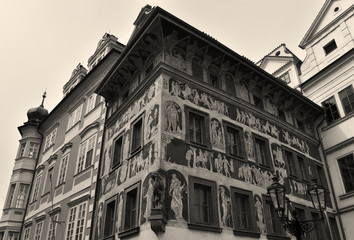An ancient painted house in Old Town Square in Prague, Czech Republic. Sepia effect.