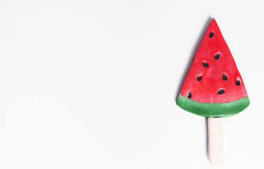 watermelon shaped ice cream pop on white background