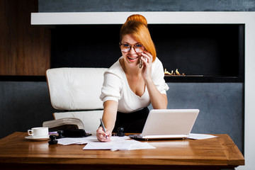 Young woman working in the office