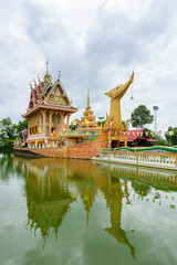 A huge Thai Suphannahong, also called Golden Swan or Phoenix boat at the WatpahSuphannahong Temple in sisaket, Thailand