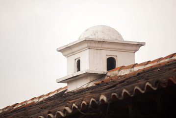 Exterior detail of house in La Antigua Guatemala, wall and cupula colonial style in Guatemala, Central America.