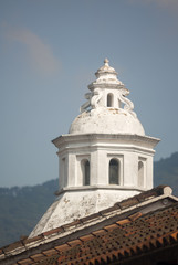 Fototapeta premium Exterior detail of house in La Antigua Guatemala, wall and cupula colonial style in Guatemala, Central America.