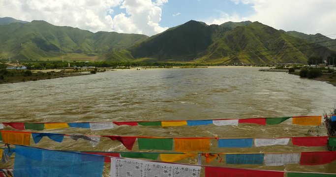 4k prayer flag on lhasa river,tibet.