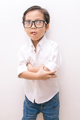 white shirt on little . smart asian boy