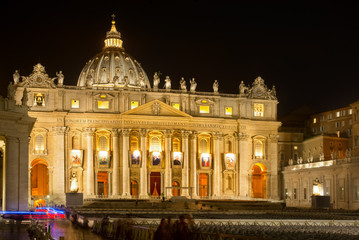 Fototapeta na wymiar Incredible lateral view on the illuminated Saint Peter's basilica, Vatican Italy