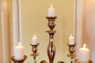 candles burning in church or palace