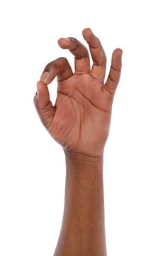 Hand showing OK sign isolated on white background