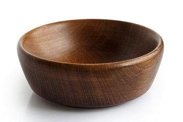 Empty dark wooden bowl isolated on white.