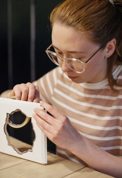 Woman making handmade invitations