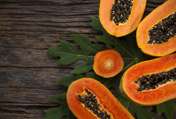 papaya slice on wooden table