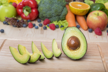 Avocado on wood table ,Healthy food concept