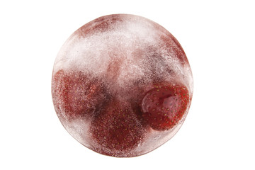 Strawberry in ice cube isolated on white background