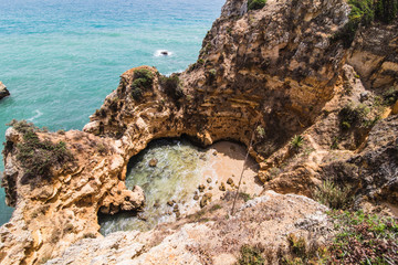 Enjoying in wonderful close up view on seascape with stunning huge rocks cliffs with seas caves