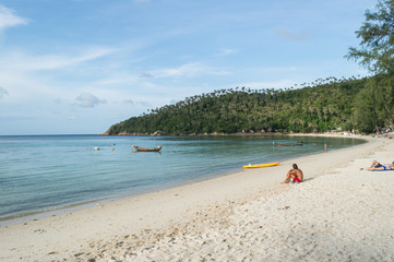 Beautiful Bay and Beach with Palms and People on Koh Pha Ngan, Thailand