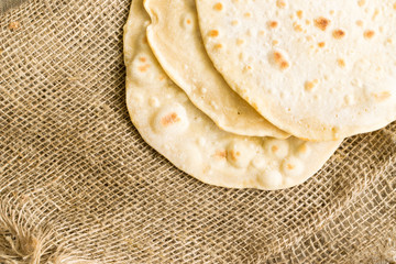 Flat Bread on a Burlap Background