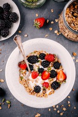 healthy breakfast bowl with homemade granola fresh blackberries and strawberries