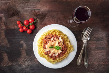 Pasta bolognese on rustic background with copyspace