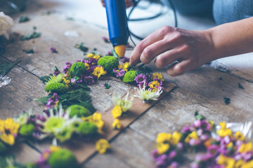 Florist making flower decoration