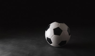 Classic soccer ball on black background.