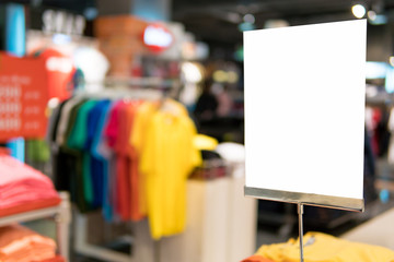 mock up advertise frame for shopping,stand for booklets with blank white sheets of paper on table,sale and discount promotion label template,christmas shopping season,copy space for text