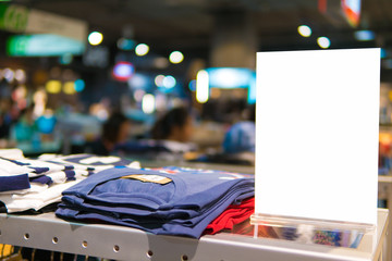 mock up advertise frame for shopping,stand for booklets with blank white sheets of paper on table,sale and discount promotion label template,christmas shopping season,copy space for text