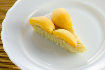 Fototapeta na wymiar Piece of apricot cake