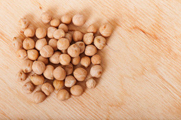Chickpea on an old wooden background.