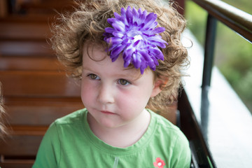 Portrait of young girl riding on train