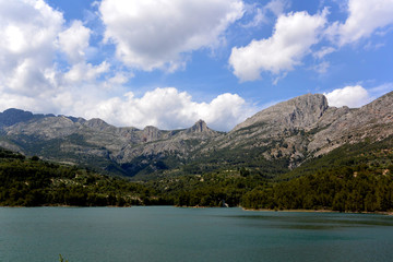 spanish  reservoir of Guadalest, an enlarged natural or artificial lake, storage pond or impoundment 
