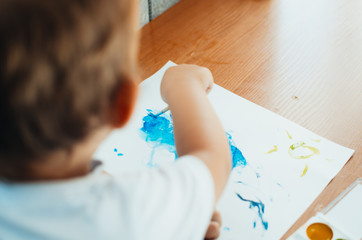 Charming draws paints on paper